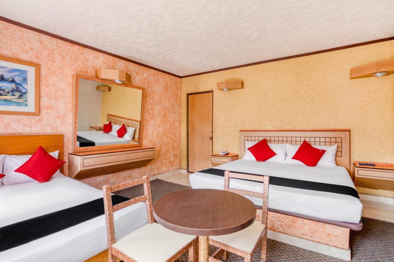 Capital O Hotel Valencia 푸에블라 외부 사진